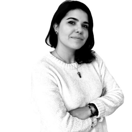 The image shows a black and white portrait of AllGenetics' staff Paula Blázquez.