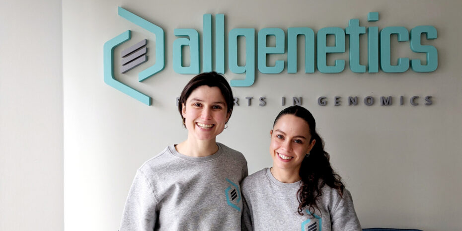 The image shows AllGenetics' staff Fátima Sánchez and Paula Ramilo.