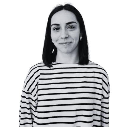 The image shows a black and white portrait of AllGenetics' staff Naiara Bello.