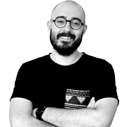 The image shows a black and white portrait of AllGenetics' staff Alberto Lema.