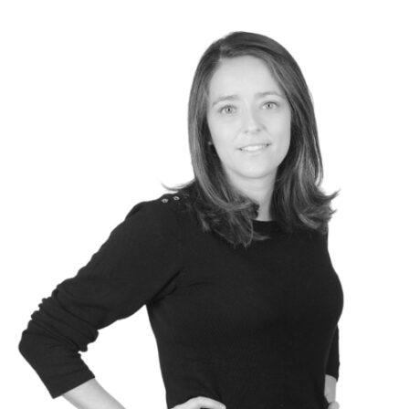 The image shows a black and white portrait of AllGenetics' staff Alejandra Perina.