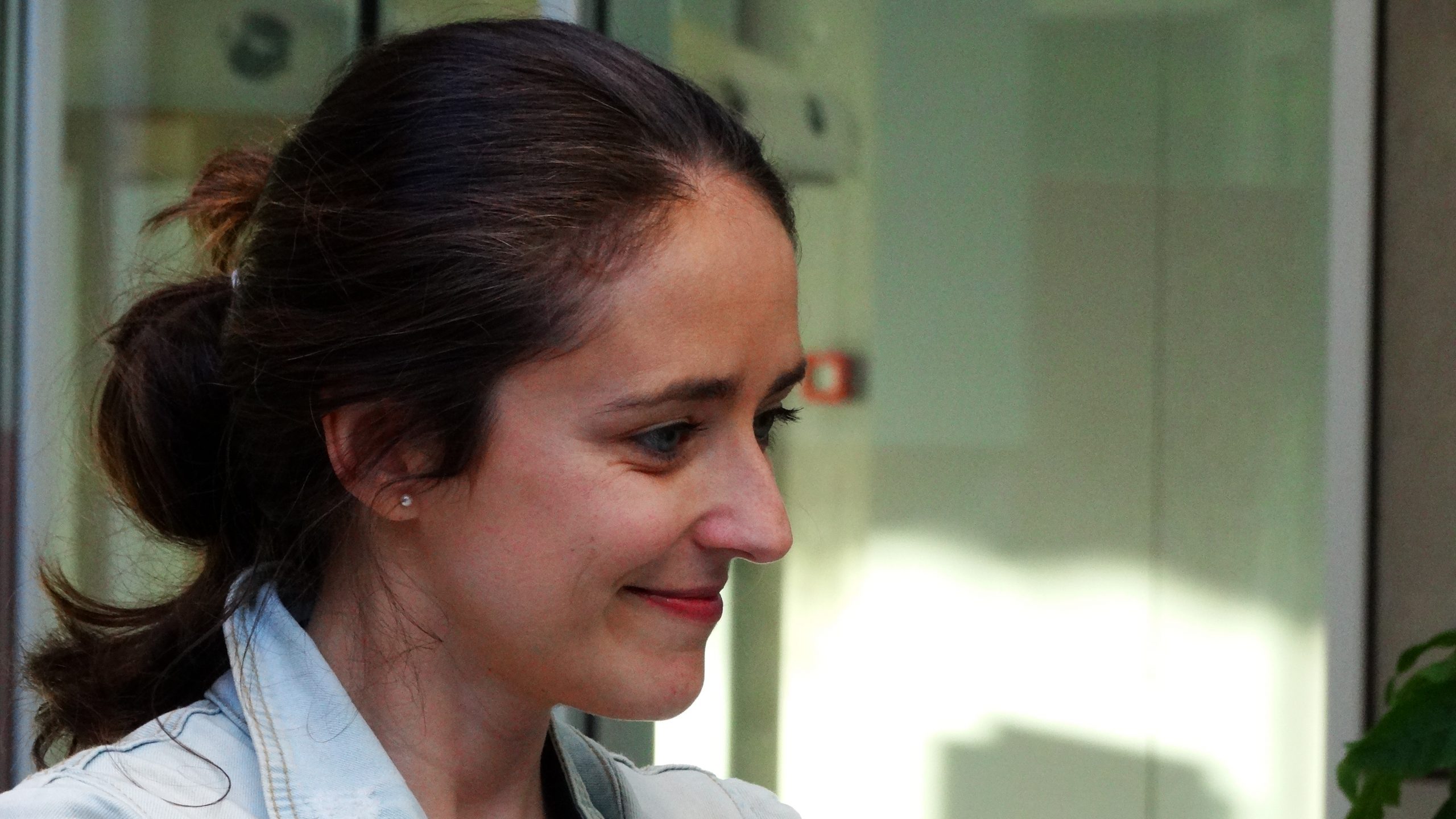 The image shows a portrait of Dr Alejandra Perina.