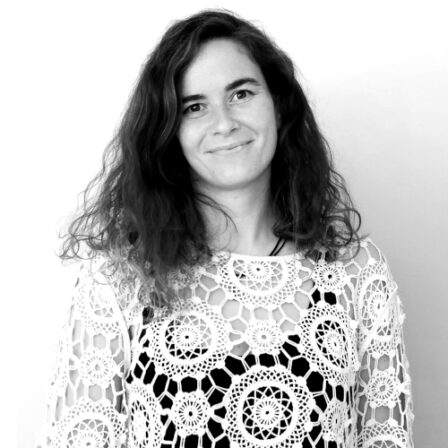 The image shows a black and white portrait of AllGenetics' staff Catarina Sánchez.