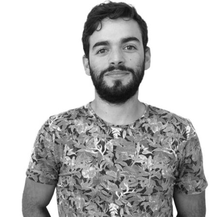 The image shows a black and white portrait of AllGenetics' staff Daniel Marquina.