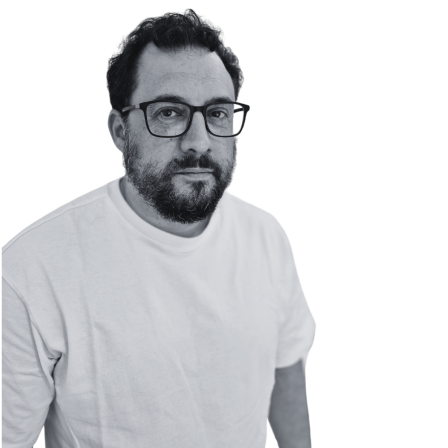 The image shows a black and white portrait of AllGenetics' staff Juan Vallejo.