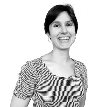 The image shows a black and white portrait of AllGenetics' staff Fátima Sánchez-Barreiro.
