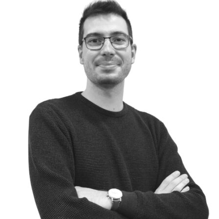 The image shows a black and white portrait of AllGenetics' staff Jorge González.