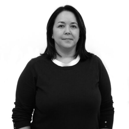 The image shows a black and white portrait of AllGenetics' staff Olga Sánchez.