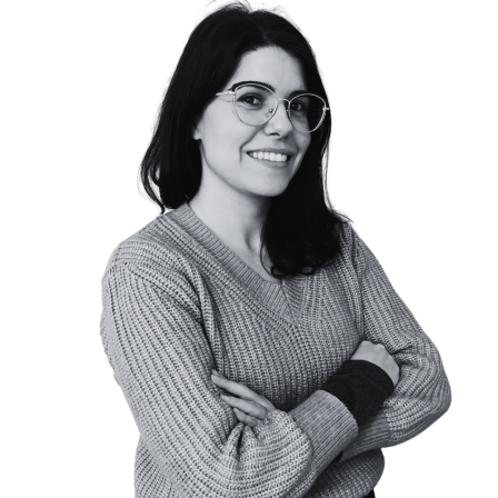 The image shows a black and white portrait of AllGenetics' staff Paula Blázquez.