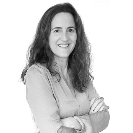 The image shows a black and white portrait of AllGenetics' staff Paula Escofet.