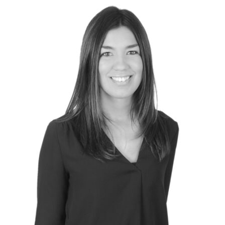 The image shows a black and white portrait of AllGenetics' staff Verónica Rojo.